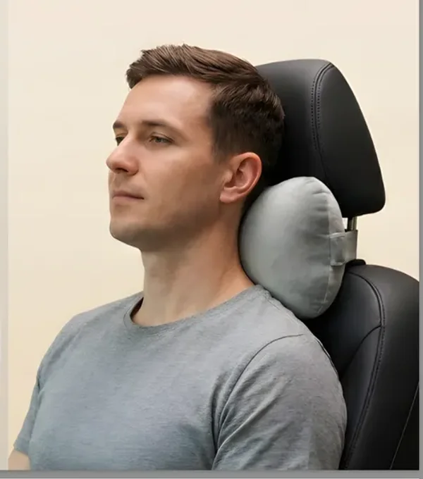 Neck held in place by a Kusho car cushion